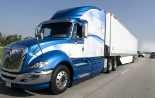 Tractor Trailer Coming Down the Road